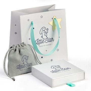 Elevate your child's special occasion attire with the Silver Ariana Multi Star Bracelet, a charming and stylish accessory perfect for christenings or first communions. This bracelet features multiple star charms, adding a touch of celestial elegance to th