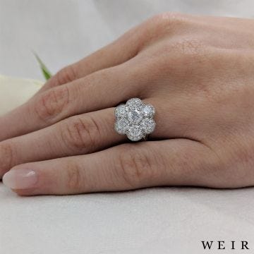 Platinum and round brilliant cut diamond engagement ring