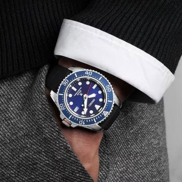 Photo of the Seiko Prospex Solar Diver 43mm watch (SNE593P1) with a blue dial, solar-powered movement, stainless steel case, and a black silicone strap