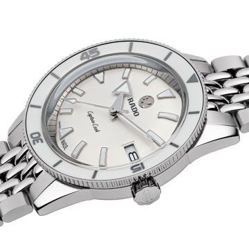 Embrace timeless elegance with the Rado Captain Cook 37mm watch. Featuring a pristine white dial, precise automatic movement, and a durable ceramic and stainless steel case, this timepiece exudes sophistication. Its stainless steel bracelet adds a touch o