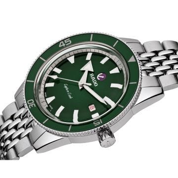 Experience the classic charm of the Rado Captain Cook 42mm watch. With a vibrant green dial, precise automatic movement, and a durable ceramic and stainless steel case, this timepiece exudes elegance. Its stainless steel bracelet adds a touch of sophistic
