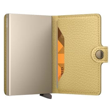 Photo of the Secrid Miniwallet Pebble Butter (MPe-ButterYellow). Close-up image of the butter yellow wallet, showcasing its textured finish and secure card storage mechanism.