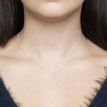 Juvi Silver K Initial Charm. Image one