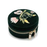 Photo of the WOLF 1834 Zoe Round Zip Case Jewellery Box in forest green, featuring a sleek, round design with a secure zip closure 393212