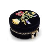 Photo of the WOLF 1834 Zoe Round Zip Case Jewellery Box in indigo, featuring a sleek round design with a secure zip closure 393216