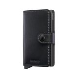 Photo of the Secrid Miniwallet Powdercoat Black (Mpc-Black). Close-up image of the sleek black wallet, showcasing its compact design and secure card storage mechanism.