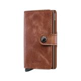Photo of the Secrid Miniwallet Vintage Cognac Brown (MV-Cognac-Brown). Close-up image of the rich cognac brown wallet, showcasing its vintage leather and secure card storage mechanism.